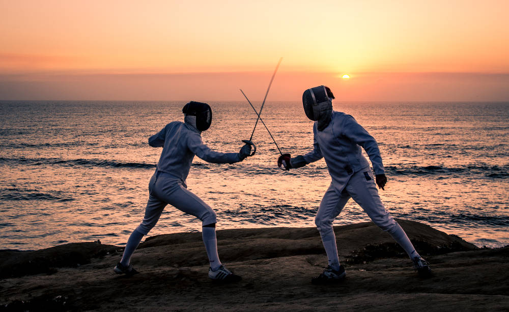Fencers must always be masked when weapons are raised, point forward