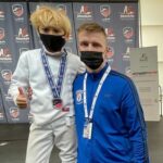 Vince Bronze with coach Roman. March NAC, Richmond, 2022